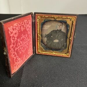 Antique 1850s tintype photo in embossed paper case formidable woman